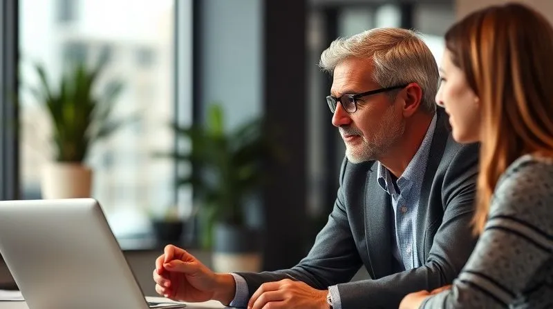 A photorealistic, professional image of a leader actively listening to a team member in a modern office setting, showing empathy and deep engagement. Cinematic lighting, 8K, sharp focus on their interaction, depth of field. Emotionally resonant.