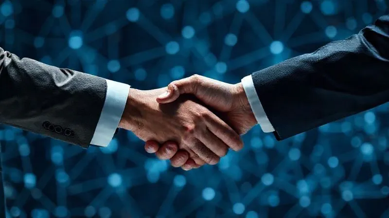 A photorealistic, professional photography, 8K, cinematic lighting, sharp focus, depth of field, shot on a high-end DSLR, of two business professionals shaking hands over a blurred background of a complex digital network, symbolizing strong communication and relationship management in a B2B channel program. The handshake is firm and sincere, conveying trust and partnership.